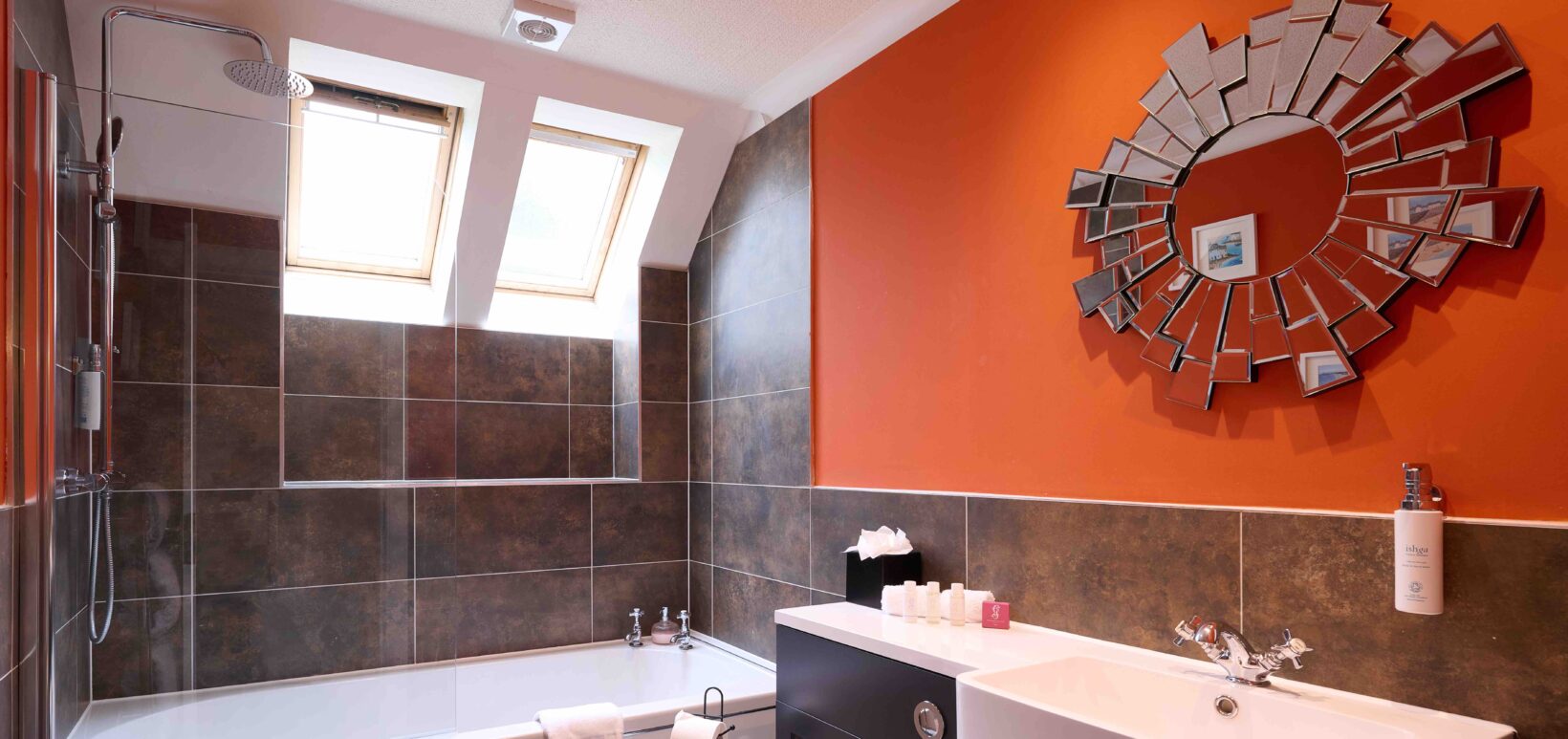 Ensuite Bathroom with shower over the bath